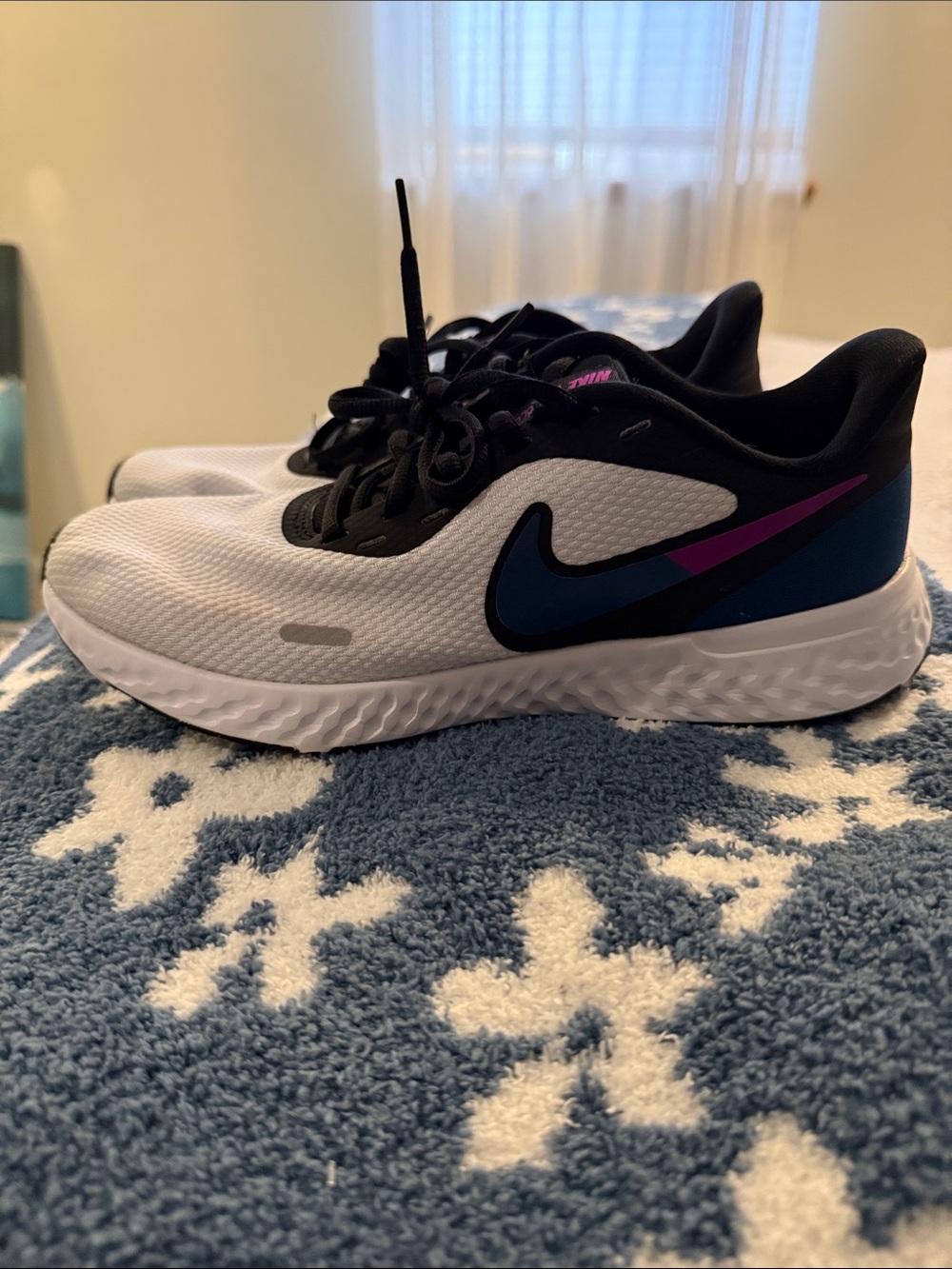 Nike Women's White Running Shoes with Black, Blue and Purple Accents